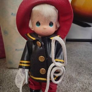 Adorable Firefighter Doll with Red and Black Outfit